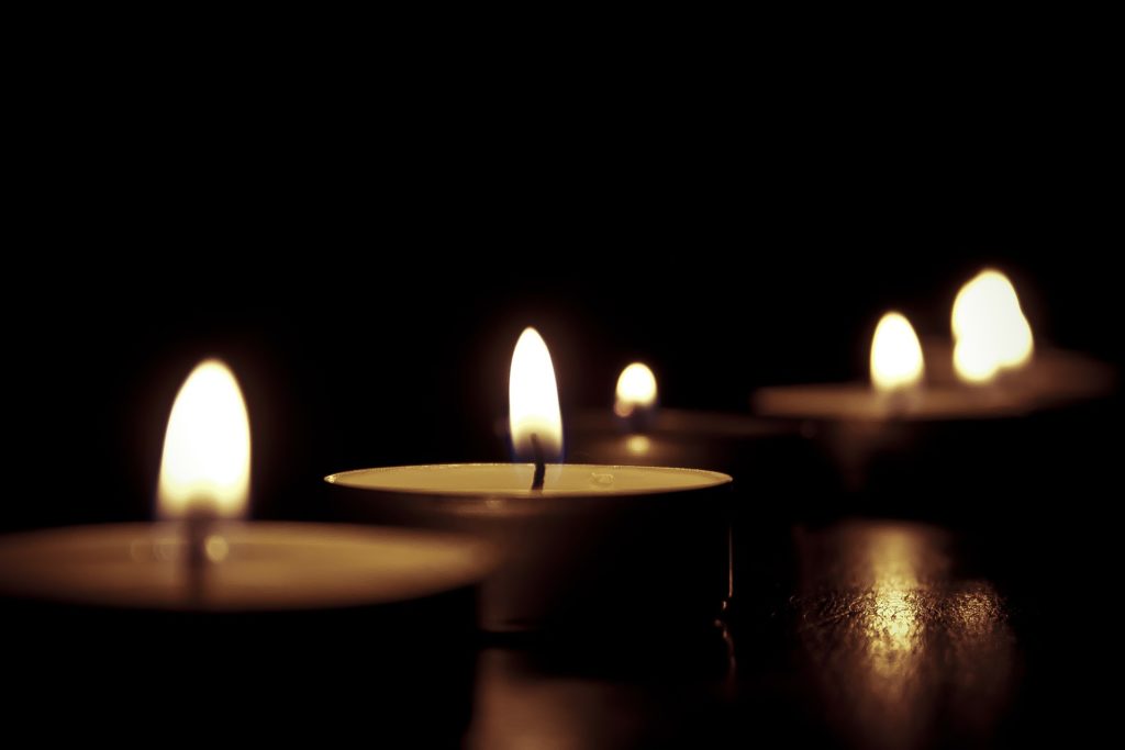 Lighted candles | Pomegranate massage offers